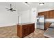 Bright kitchen with stainless steel appliances, island, and ample space for Gathering gatherings at 6602 W Lariat Ln, Phoenix, AZ 85083