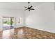 Bright living room with sliding glass door and tile flooring at 6602 W Lariat Ln, Phoenix, AZ 85083
