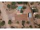 Aerial view showing the home's layout, pool, desert landscaping, and property boundaries at 6608 E Ranch Rd, Cave Creek, AZ 85331