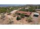 Attractive aerial view of desert home surrounded by natural landscape and mature cacti at 6608 E Ranch Rd, Cave Creek, AZ 85331