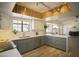 Open kitchen showcasing gray cabinets, modern countertops, stainless steel appliances, and an open layout at 6608 E Ranch Rd, Cave Creek, AZ 85331
