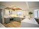 Spacious kitchen with stainless steel appliances, sleek counter tops, and bright light at 6608 E Ranch Rd, Cave Creek, AZ 85331