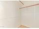Spacious walk-in closet with ample shelving and rod space for organized storage at 662 W Laguna Azul Ave, Mesa, AZ 85210