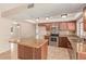 Kitchen featuring granite countertops, stainless appliances, with attached breakfast bar at 662 W Laguna Azul Ave, Mesa, AZ 85210