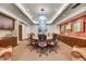 This conference room features a large round table, comfortable seating, and modern technology for professional meetings at 6803 E Main St # 5506, Scottsdale, AZ 85251
