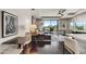 Open concept living space with modern decor and large windows, seamlessly connecting indoor and outdoor living at 6803 E Main St # 5506, Scottsdale, AZ 85251