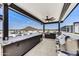 Outdoor kitchen with stainless steel grill, sink, and countertop space for easy food preparation with scenic views at 6803 E Main St # 5506, Scottsdale, AZ 85251