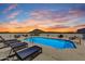 Enjoy this community rooftop pool with lounge chairs, offering a relaxing oasis with stunning sunset views at 6803 E Main St # 5506, Scottsdale, AZ 85251