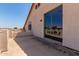 Outdoor balcony with a large sliding glass door at 7418 S 25Th Ln, Phoenix, AZ 85041