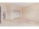 Spacious bedroom with an empty closet and an open doorway at 7418 S 25Th Ln, Phoenix, AZ 85041