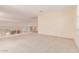 Open loft space features decorative railings and neutral carpet at 7418 S 25Th Ln, Phoenix, AZ 85041