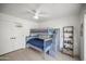Playful ' bedroom featuring a bunk bed and ample storage shelves, perfect for a growing Gathering at 802 E Harwell Rd, Gilbert, AZ 85234