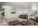 Spacious living room featuring comfortable seating, neutral tones, and a cozy atmosphere for relaxation at 802 E Harwell Rd, Gilbert, AZ 85234