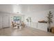 Bright living area featuring stylish furniture, a large window for natural light, and elegant decor at 802 E Harwell Rd, Gilbert, AZ 85234