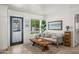 Cozy sitting area showcasing a comfortable couch, natural light, and stylish decor at 802 E Harwell Rd, Gilbert, AZ 85234