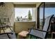 Inviting balcony with seating and views of the neighborhood at 850 S River Dr # 2065, Tempe, AZ 85281