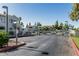 Gated entrance to the residential community with mature trees at 850 S River Dr # 2065, Tempe, AZ 85281