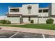 Charming exterior view of a home with a well-maintained lawn and sidewalks at 850 S River Dr # 2065, Tempe, AZ 85281