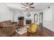 Relaxing living room with a fireplace, plush furniture, and modern lighting fixtures at 850 S River Dr # 2065, Tempe, AZ 85281
