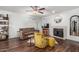 Cozy living room with a fireplace, comfortable seating, and stylish decor at 850 S River Dr # 2065, Tempe, AZ 85281