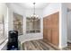 Bright breakfast nook with ample natural light and built-in pantry storage at 930 N Sandal Cir, Mesa, AZ 85205