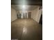 Spacious garage with ample storage cabinets and additional refrigerator for convenience at 930 N Sandal Cir, Mesa, AZ 85205