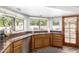 Updated kitchen features granite counters, stainless appliances and view to backyard at 930 N Sandal Cir, Mesa, AZ 85205