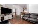 Open-concept living area with hardwood floors and comfortable seating, perfect for relaxation at 930 N Sandal Cir, Mesa, AZ 85205