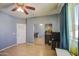 Guest bedroom with closet, light wood floors, and lots of space for all your needs at 9347 E Hillview Cir, Mesa, AZ 85207