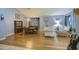 Formal living and dining room with hardwood floors, elegant decor, and natural light at 9347 E Hillview Cir, Mesa, AZ 85207