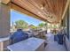 Spacious outdoor kitchen with a built-in barbecue and wooden ceiling, ideal for entertaining at 9347 E Hillview Cir, Mesa, AZ 85207