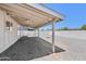 The backyard is designed with a covered patio and gravel at 1017 S Allen --, Mesa, AZ 85204
