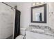 Stylish bathroom with modern vanity, marble countertops, and updated shower with black accents at 1017 S Allen --, Mesa, AZ 85204