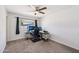 Well-lit bedroom with ample space, neutral carpet, and a practical workspace near the window at 1017 S Allen --, Mesa, AZ 85204