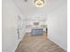 Bright and modern kitchen featuring a center island with pendant lights, granite countertops, and white cabinets at 1017 S Allen --, Mesa, AZ 85204