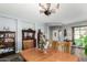 Elegant dining room featuring wooden table, decorative chandelier, and views to the entrance at 10359 E Jacob Ave, Mesa, AZ 85209