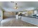 Spacious living room with tile flooring and lots of natural light at 10524 W Pima St, Tolleson, AZ 85353