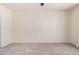 Large bedroom features neutral carpet, a ceiling fan, and generous space at 11826 W Villa Hermosa Ln, Sun City, AZ 85373