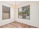 Dining room with tile floors, a stylish pendant light, and natural light at 11826 W Villa Hermosa Ln, Sun City, AZ 85373
