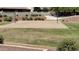 Sand volleyball court in a grassy community park with landscaping, set for friendly games at 12109 W Tether Trl, Peoria, AZ 85383