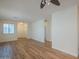 Spacious living room with modern flooring, large windows, and easy access to other rooms at 125 N 22Nd Pl # 5, Mesa, AZ 85213