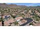 Neighborhood aerial view showcases mature desert landscaping and mountain views at 12638 E Cortez Dr, Scottsdale, AZ 85259