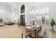 Elegant dining area featuring high ceilings, large windows, and an open floor plan at 12638 E Cortez Dr, Scottsdale, AZ 85259