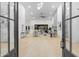 Inviting foyer with high ceilings, stone fireplace, and open floor plan at 12638 E Cortez Dr, Scottsdale, AZ 85259