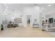 Open-concept great room with view of dining room, entry, and living area, all with high ceilings at 12638 E Cortez Dr, Scottsdale, AZ 85259