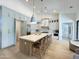 Bright kitchen features oversized island with marble countertops, modern stainless appliances and ample cabinet space at 12638 E Cortez Dr, Scottsdale, AZ 85259