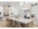 Kitchen featuring a large island with bar seating, stainless steel appliances, and pendant lighting at 12638 E Cortez Dr, Scottsdale, AZ 85259