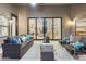 Inviting covered patio with comfortable seating and view to inside at 12638 E Cortez Dr, Scottsdale, AZ 85259