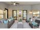 Inviting covered patio with comfortable seating and view to inside at 12638 E Cortez Dr, Scottsdale, AZ 85259
