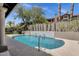 Swimming pool with water feature and views of the house and landscaping at 12638 E Cortez Dr, Scottsdale, AZ 85259